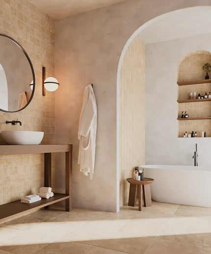 Modern bathroom with a sink, mirror, and bathtub.