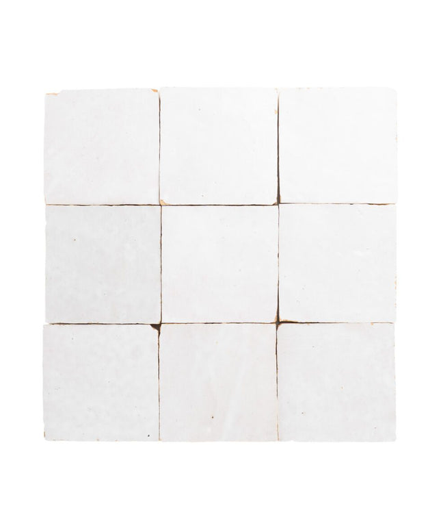 Handmade 4x4 white zellige tiles with subtle texture, ideal for backsplash or bathroom walls