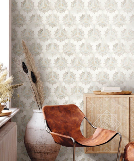 Floral hexagon tile wall in a modern living room with leather chair and ceramic vase