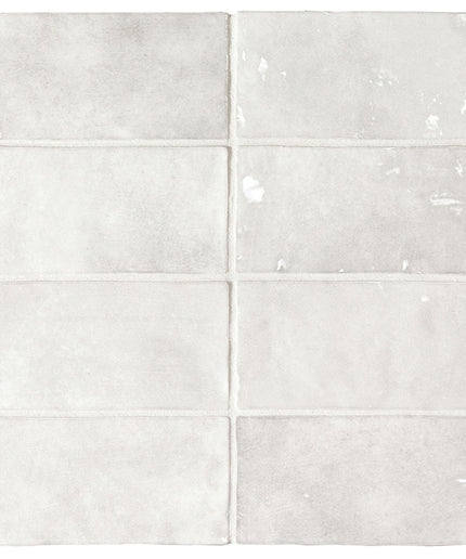 White ceramic tiles arranged in a grid pattern