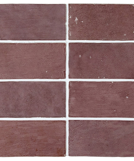 Set of six brown tiles with varying textures on a white background