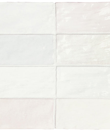 White ceramic tiles arranged in a grid pattern on a white background