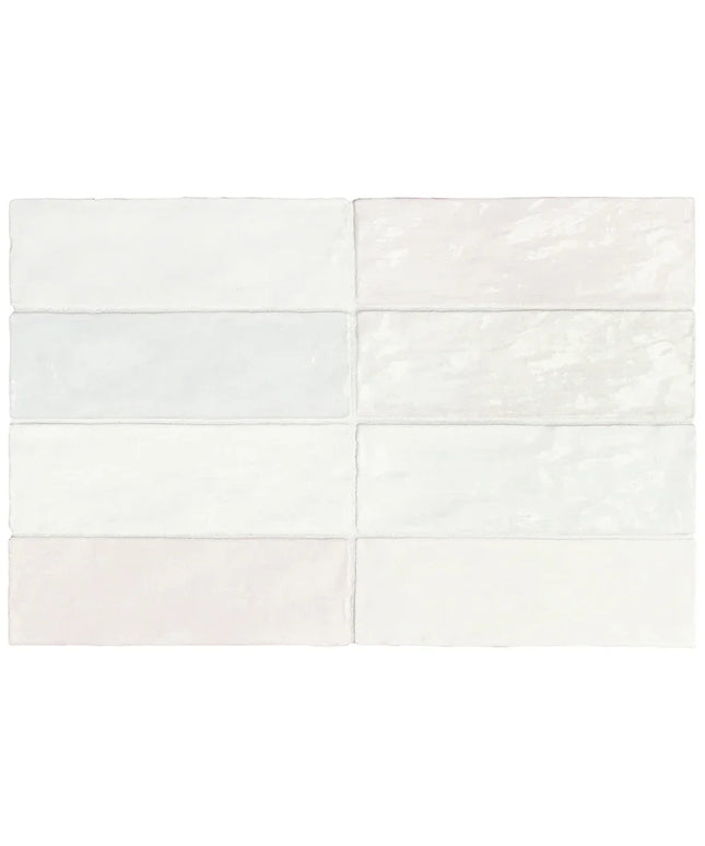 White ceramic tiles arranged in a grid pattern on a white background