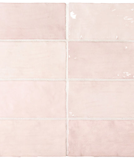 Set of pink tiles with clear plastic covers on a light pink background