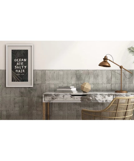 Greige rustic wall tiles in a home office with a modern desk and decor accents