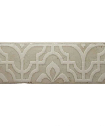 Greige decorative tile with raised geometric and floral pattern, suitable for backsplash or accent.