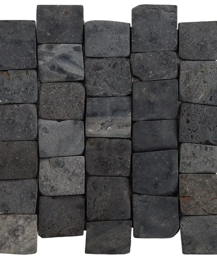 Pattern of dark gray stone tiles on a white background