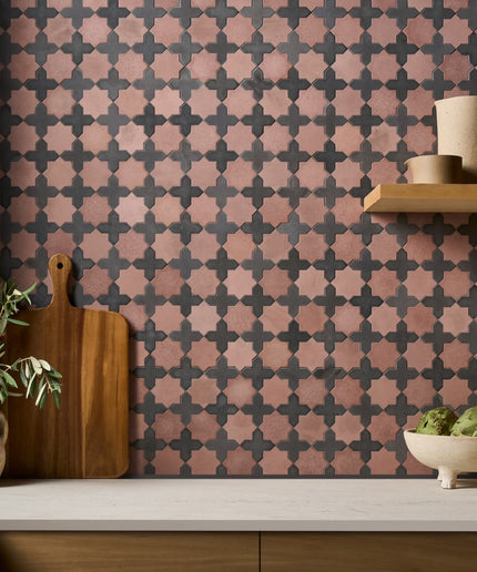 Alpana mara tiles single pieces. Patterned wallpaper with geometric design in a room with a shelf and decor items.
