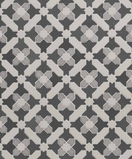 Patterned tile design with geometric shapes in black, white, and gray.