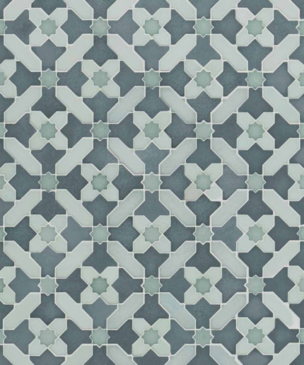 Patterned tile design with geometric shapes in blue and green tones.
