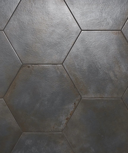 Hexagonal tiles with a gray, textured pattern