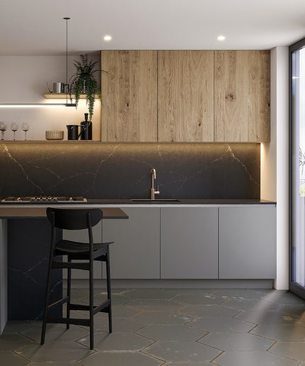 Modern kitchen with wooden cabinets, marble backsplash, and bar area.