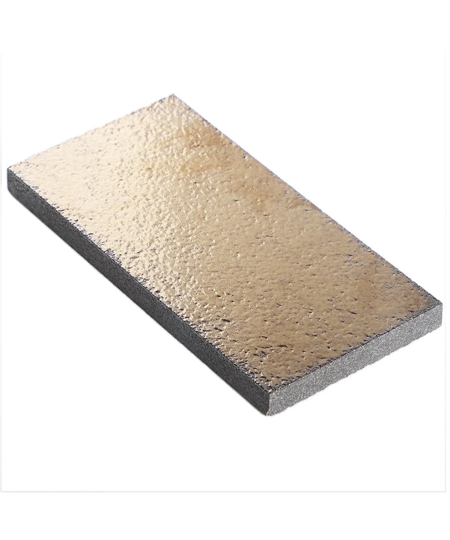 Rectangular stone with two-tone color pattern on a white background