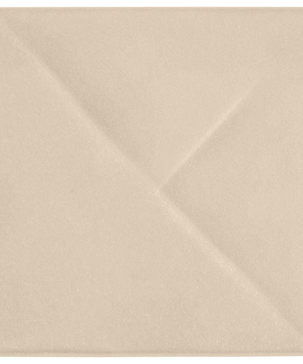 Beige envelope with a textured surface on a white background