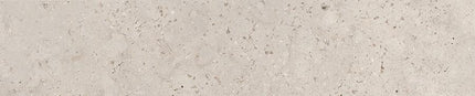 Beige stone-look rectangular tile with subtle speckled texture for floors or backsplash