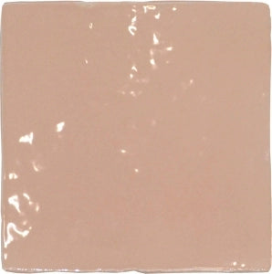glossy pink ceramic tile with textured surface, perfect for backsplash or bathroom decor