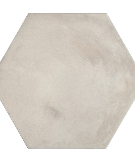 Hexagonal tile with a beige color on a white background