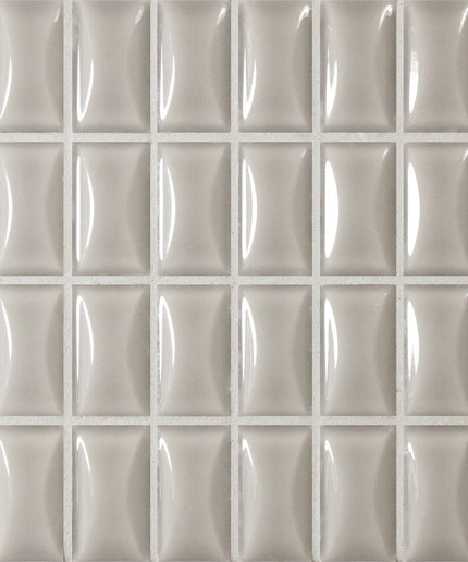 bevel-pearl-gloss Grid of light gray tiles