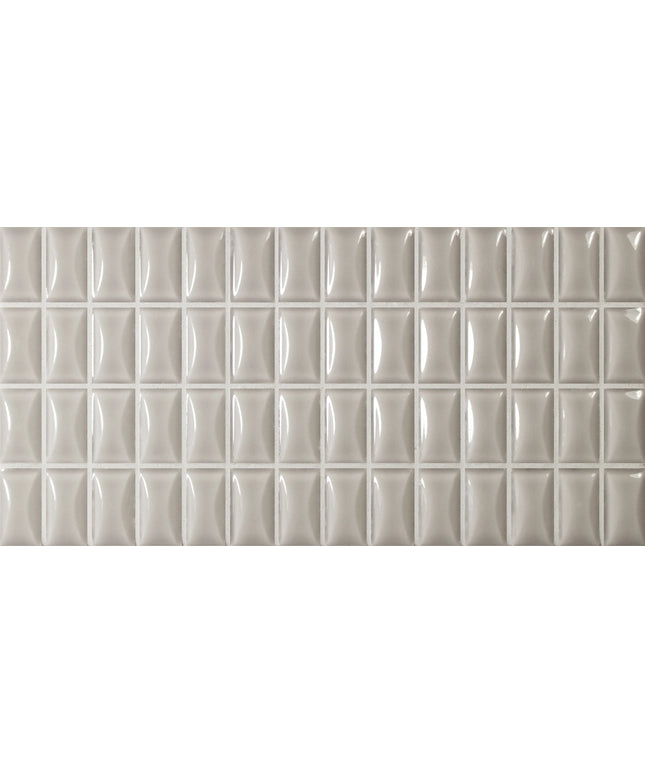 bevel-pearl-gloss Grid of light gray tiles