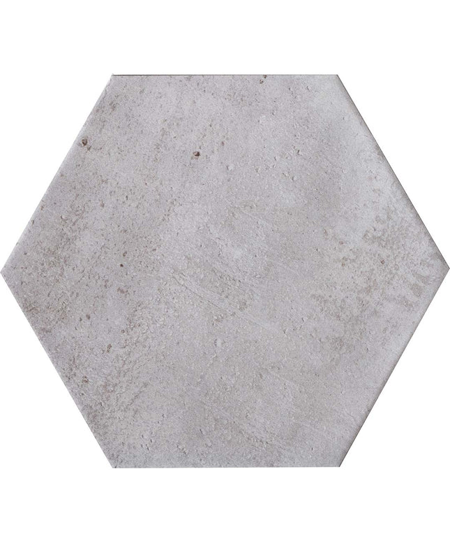 Hexagonal concrete tile with a gray finish on a white background