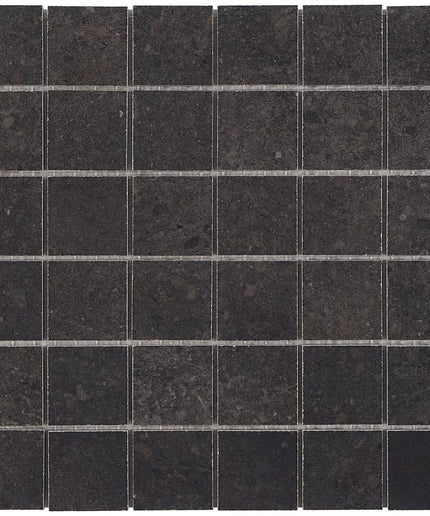 Black square tiles arranged in a grid pattern made in the USA