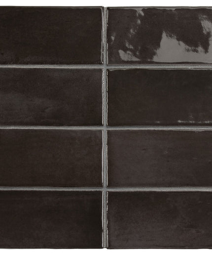 Black rectangular tiles arranged in a grid pattern