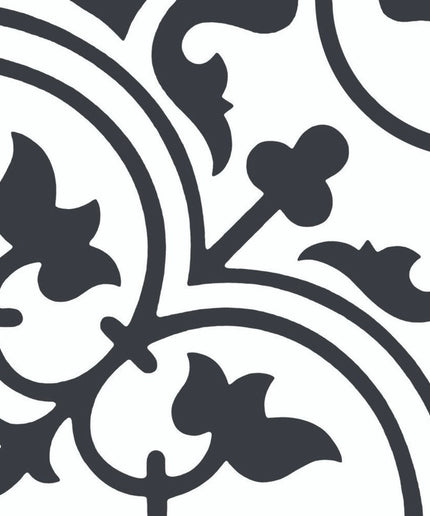Black and white 8x8 decorative tile with bold floral and geometric pattern