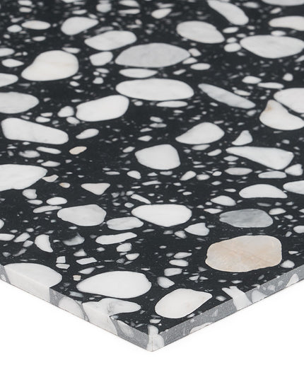 Close-up of a black and white terrazzo patterned surface