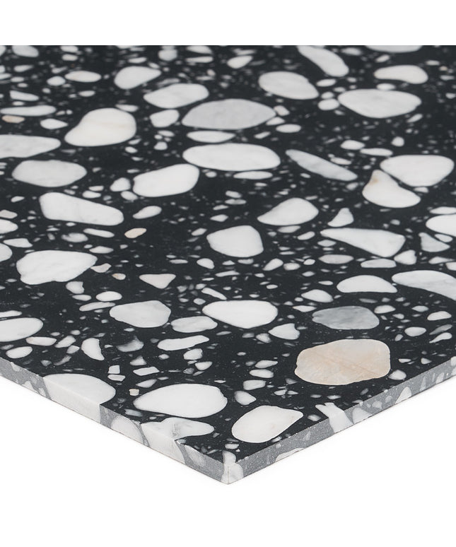 Close-up of a black and white terrazzo patterned surface