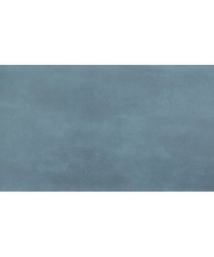 Rectangular blue tile with a textured surface on a white background