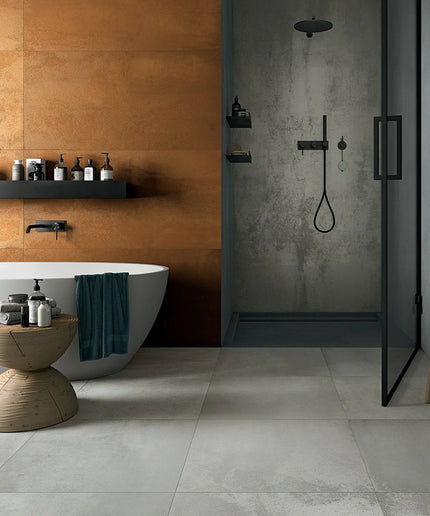 Modern bathroom with a bathtub, shelves, and a shower area.