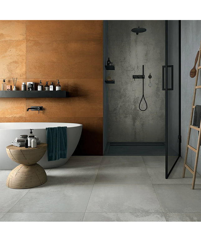 Modern bathroom with a bathtub, shelves, and a shower area.