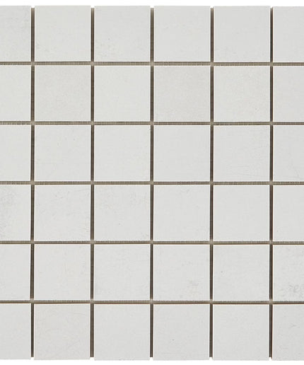 White square tiles with a subtle pattern on a white background