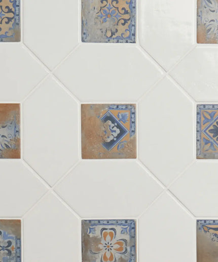 Hexagonal tiles with decorative patterns on a white background