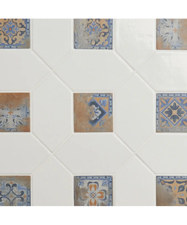 Hexagonal tiles with decorative patterns on a white background
