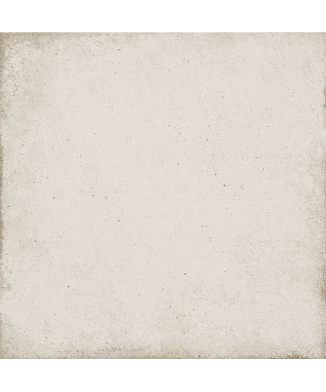 A square textured tile or backdrop with a distressed, vintage-style finish. The surface has a warm off-white, cream base with subtle speckling and darker brownish-gray weathered edges.