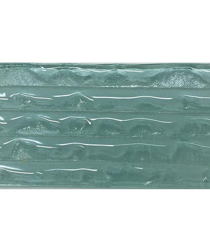 Glossy aqua blue textured glass wall tile with wavy surf pattern