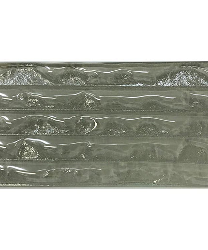 Rectangular glass tile with textured wave pattern, ideal for backsplash or bathroom walls