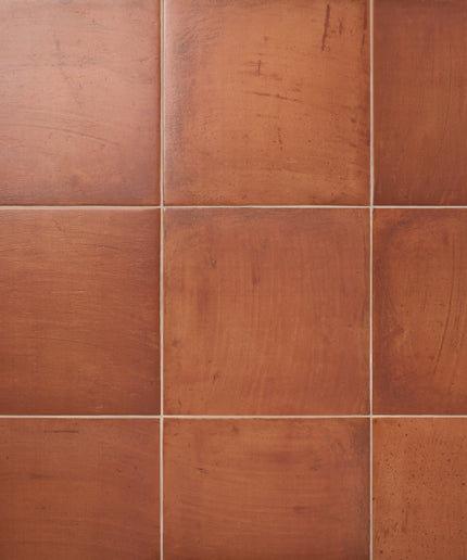 Terracotta floor tile with rustic finish, 18x18 inch, ideal for kitchens or bathrooms