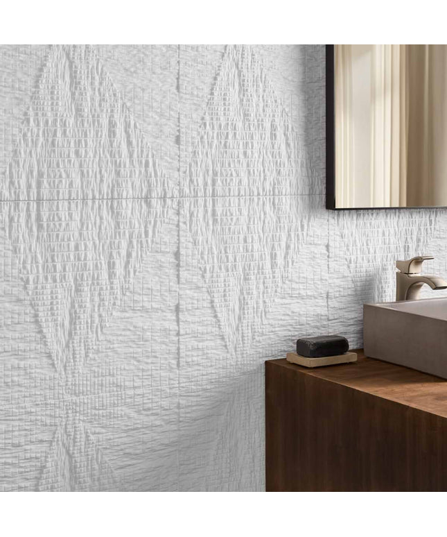 Bathroom with textured white wall tiles and wooden vanity.