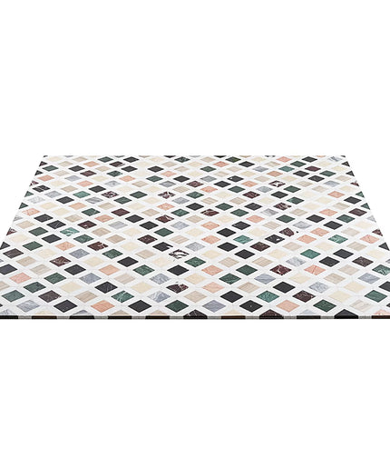 Patterned mat with geometric design on a white background