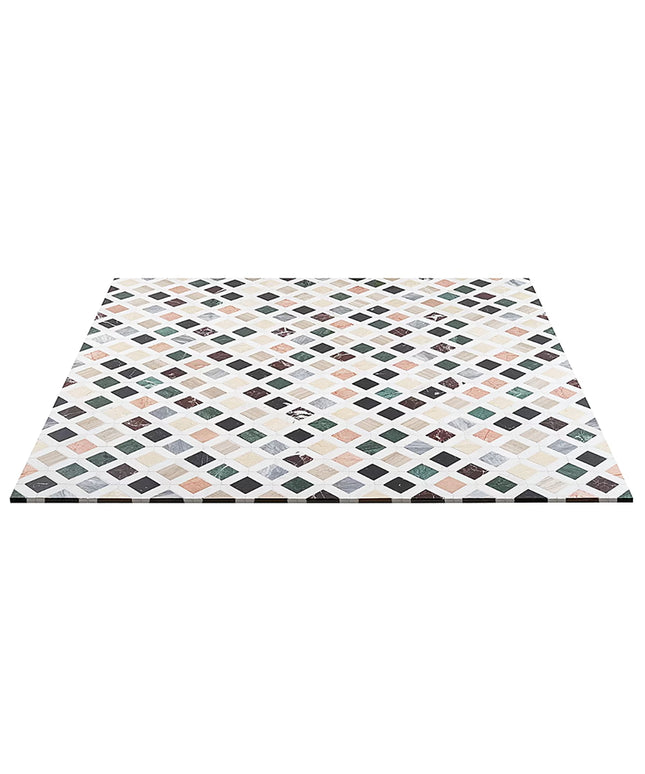 Patterned mat with geometric design on a white background