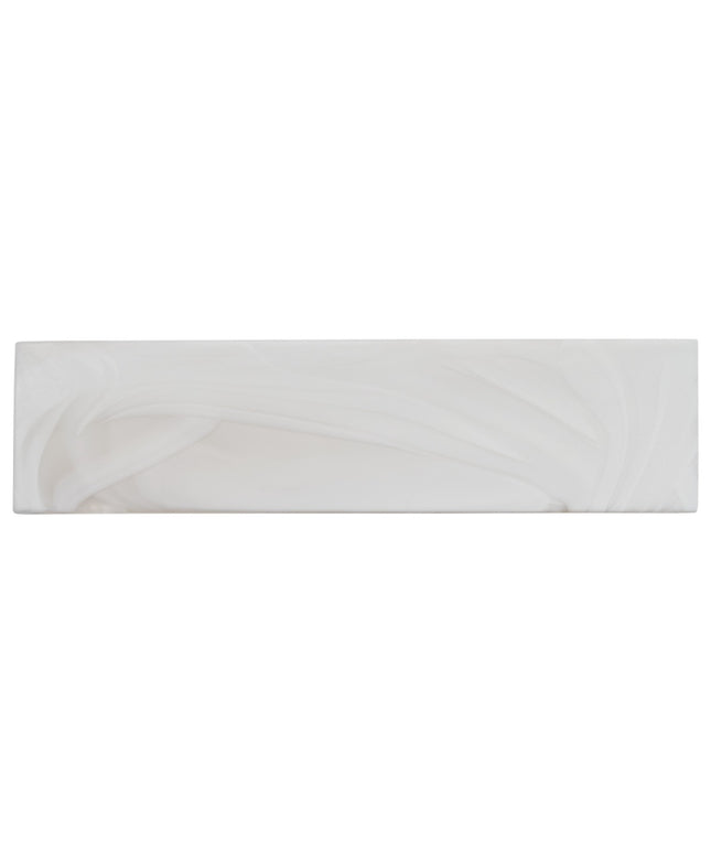 Rectangular white tile with subtle pattern on a white background