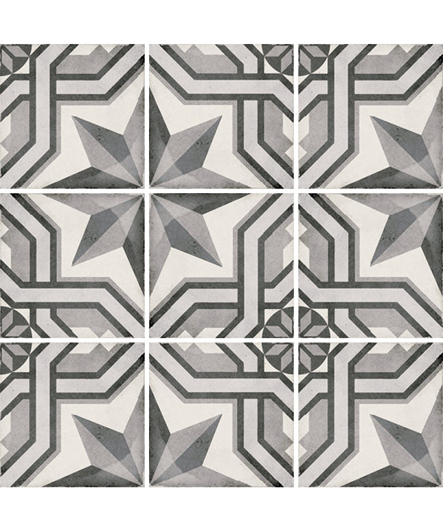Geometric patterned tiles in shades of gray, black, and off-white, arranged in a grid with white grout lines.