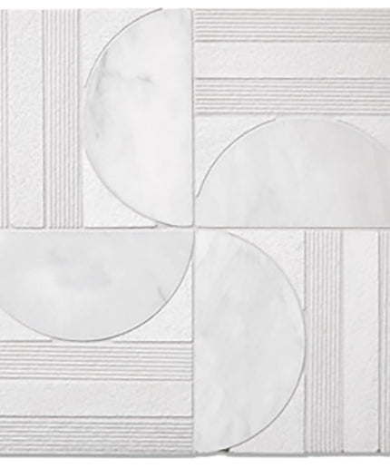 White decorative wall panels with geometric patterns on a white background