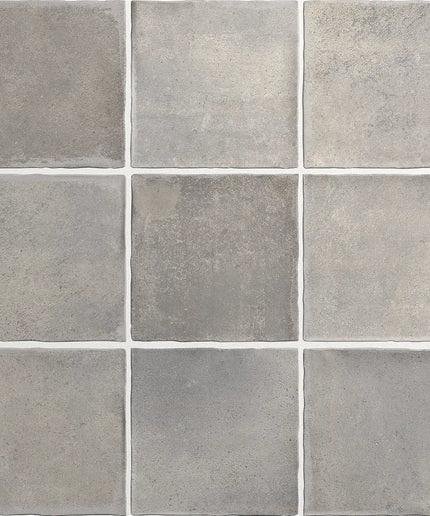 Grid of gray tiles with a subtle pattern