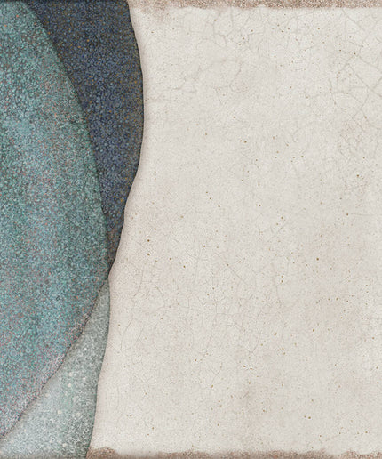 Close-up of two textured tiles, one blue and one beige, with a visible joint between them.