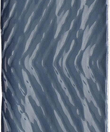 Rectangular tile with wavy blue pattern on a white background