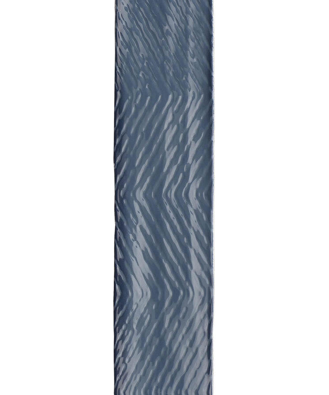 Rectangular tile with wavy blue pattern on a white background