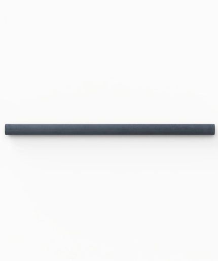 A minimalist, matte black cylindrical wall-mounted shelf or bar, shown horizontally against a clean white background.